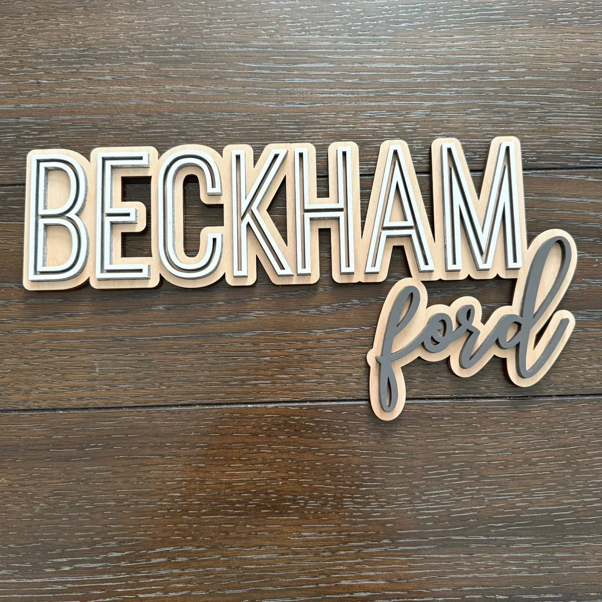 Custom layered wood and acrylic name sign — laser engraved personalized home décor