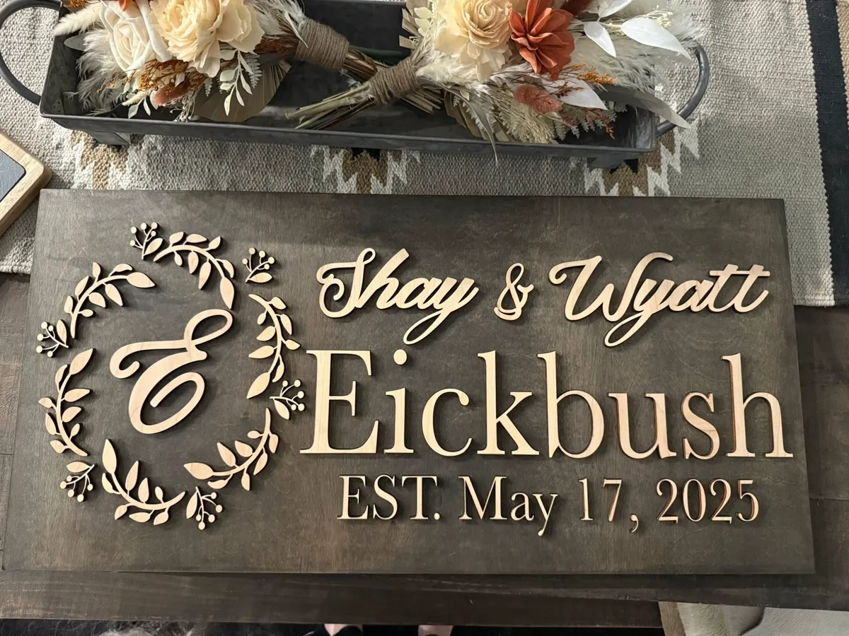 Custom laser engraved wedding family name sign — Eickbush Est. 2025, dark wood