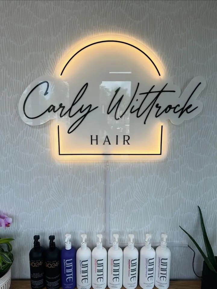 Custom backlit acrylic business sign — laser engraved by Palm Coast Customs, Estero FL