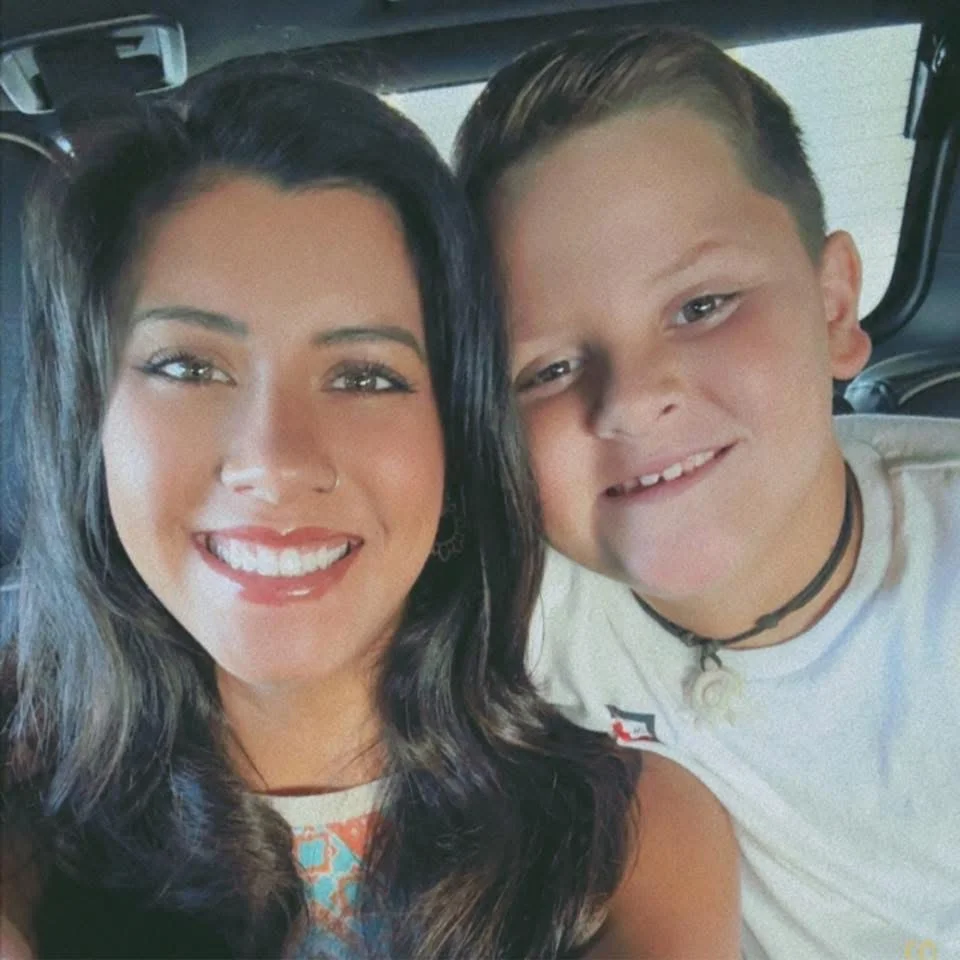 Owner of Palm Coast Customs with her son — woman-owned laser engraving business in Estero, Florida